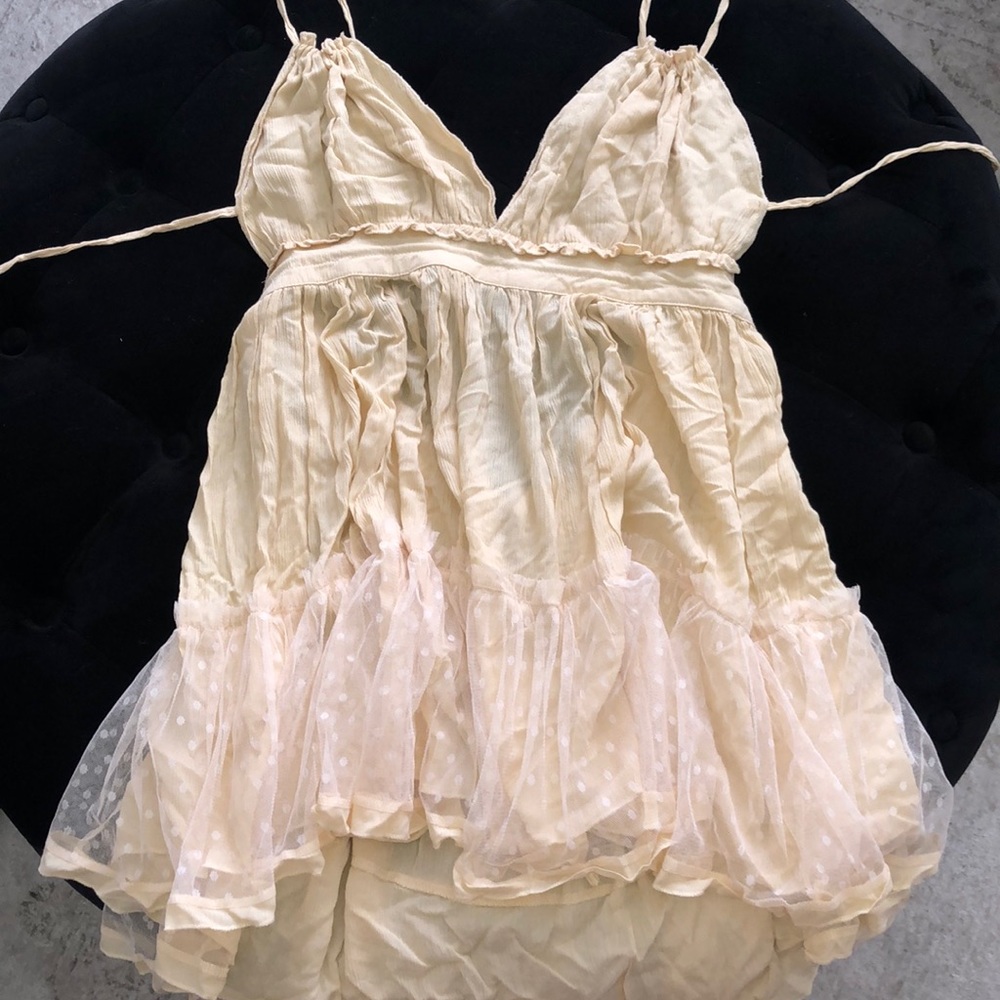 Cream flowy summer dress.